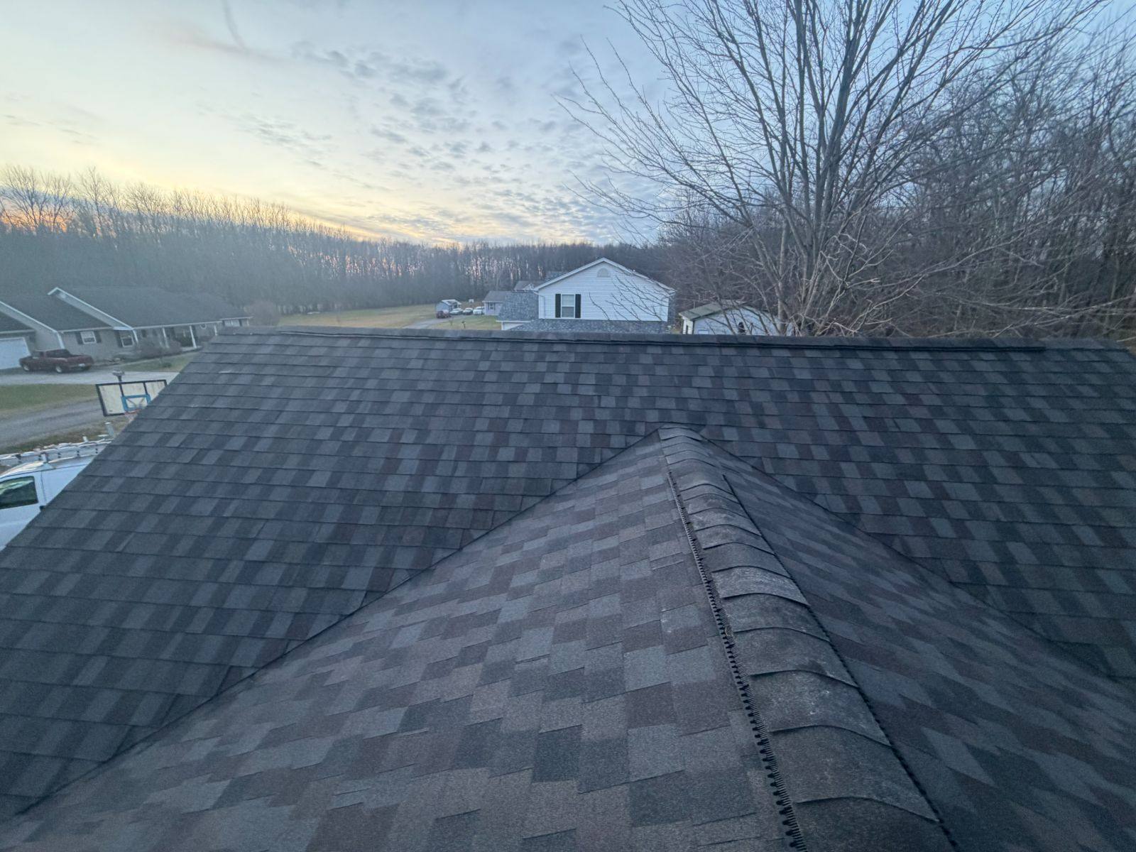 Fresh shingles from ridge to eave by Resolute Construction and Remodel