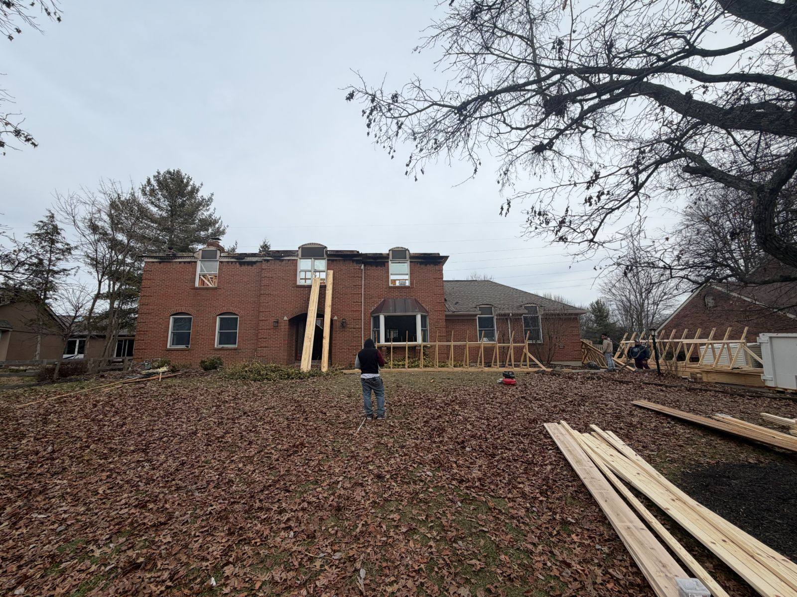 Damaged roof torn off for the rebuild by Resolute Construction and Remodel